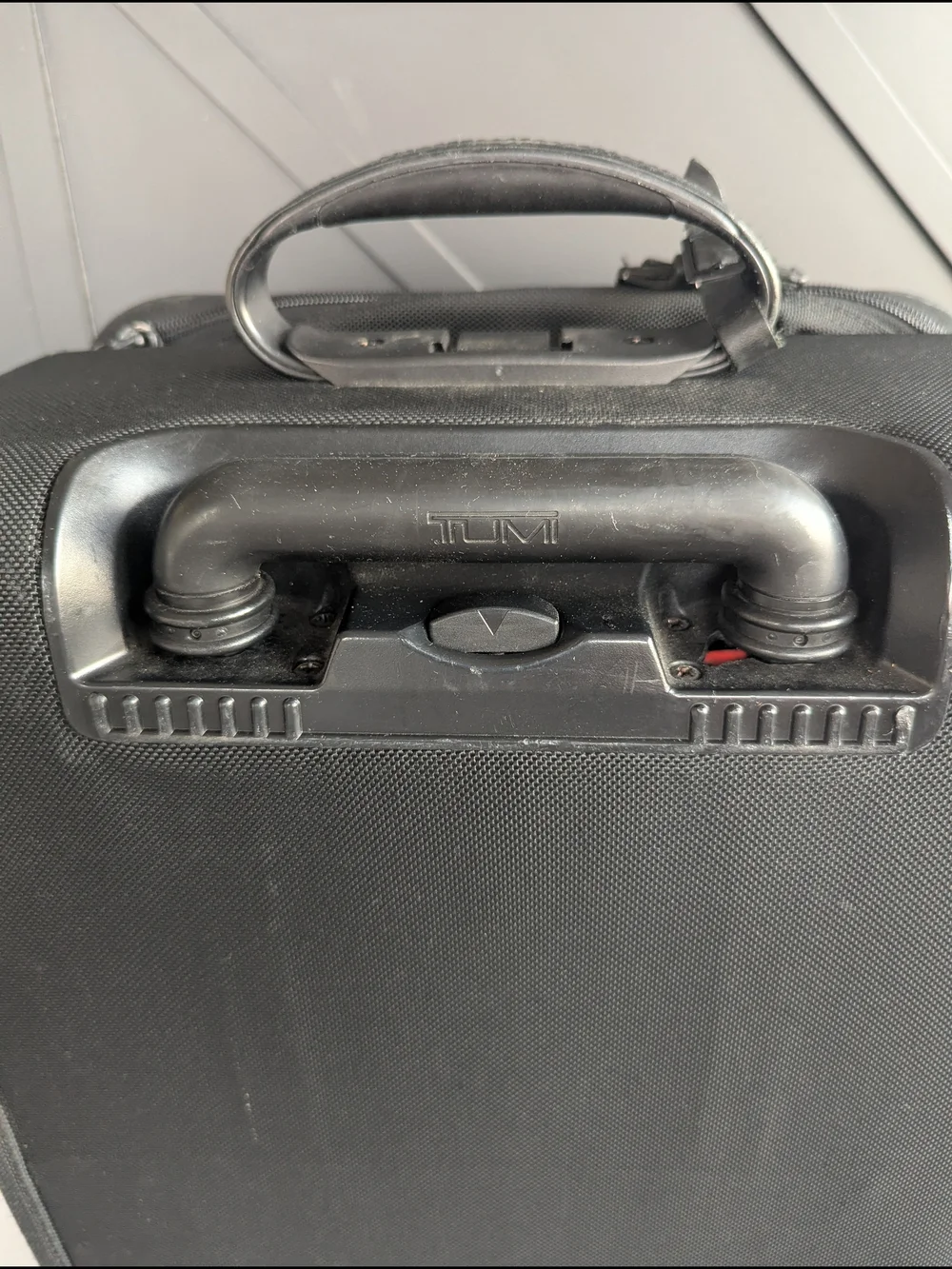Tumi Black Men’s Carry-On Rolling Travel Bag